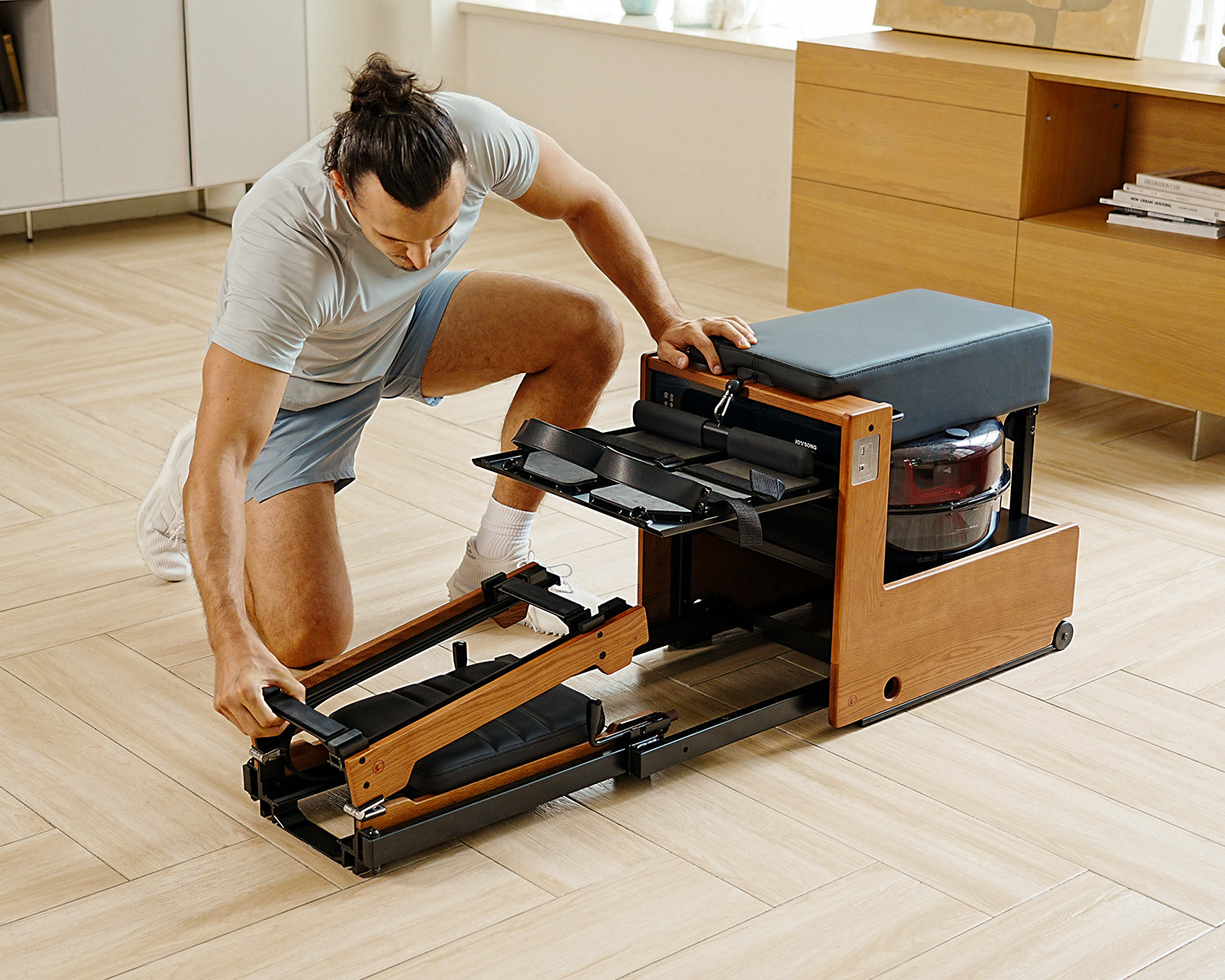Space-saving compact rowing machine
