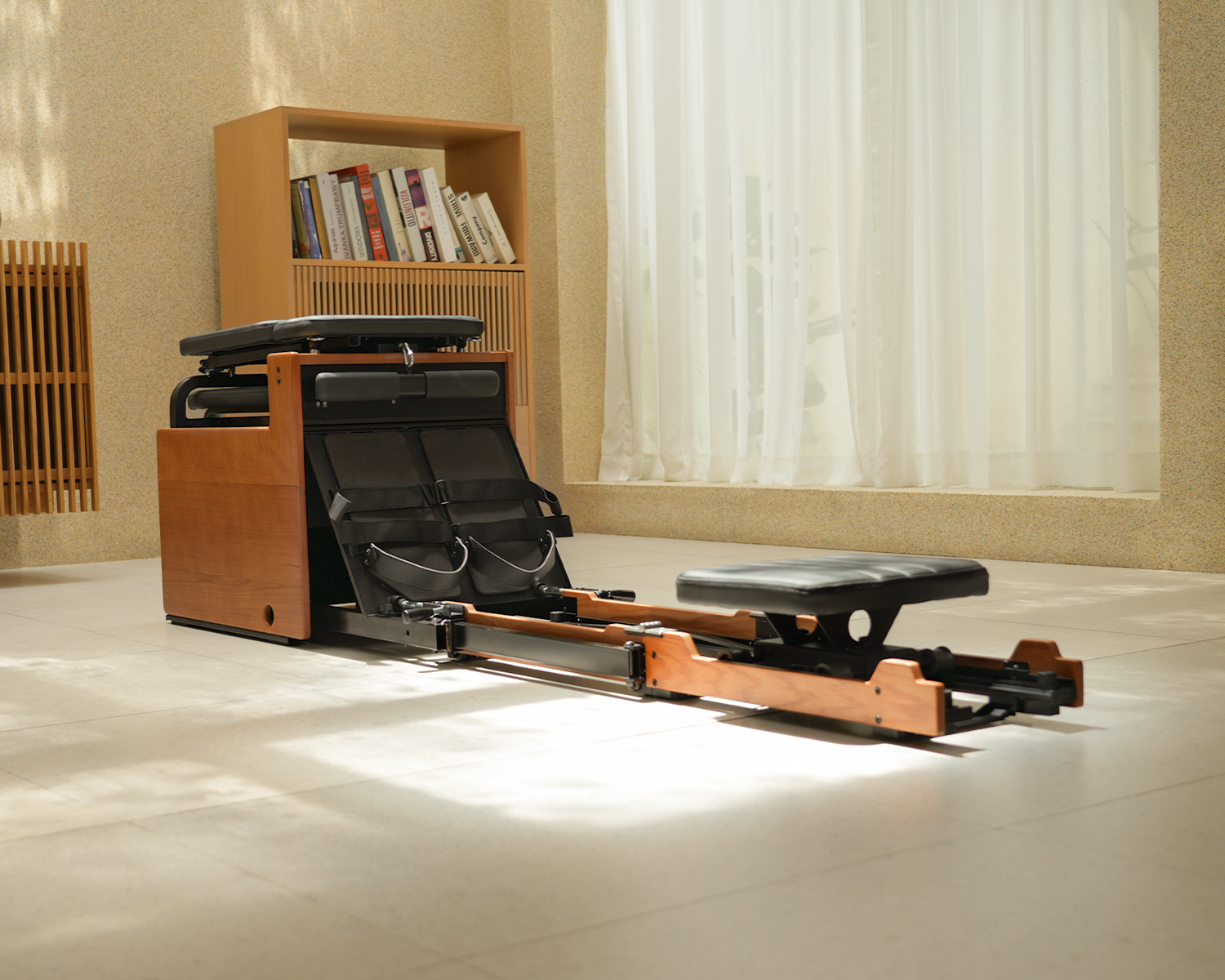 Home gym rowing machine in rowing mode