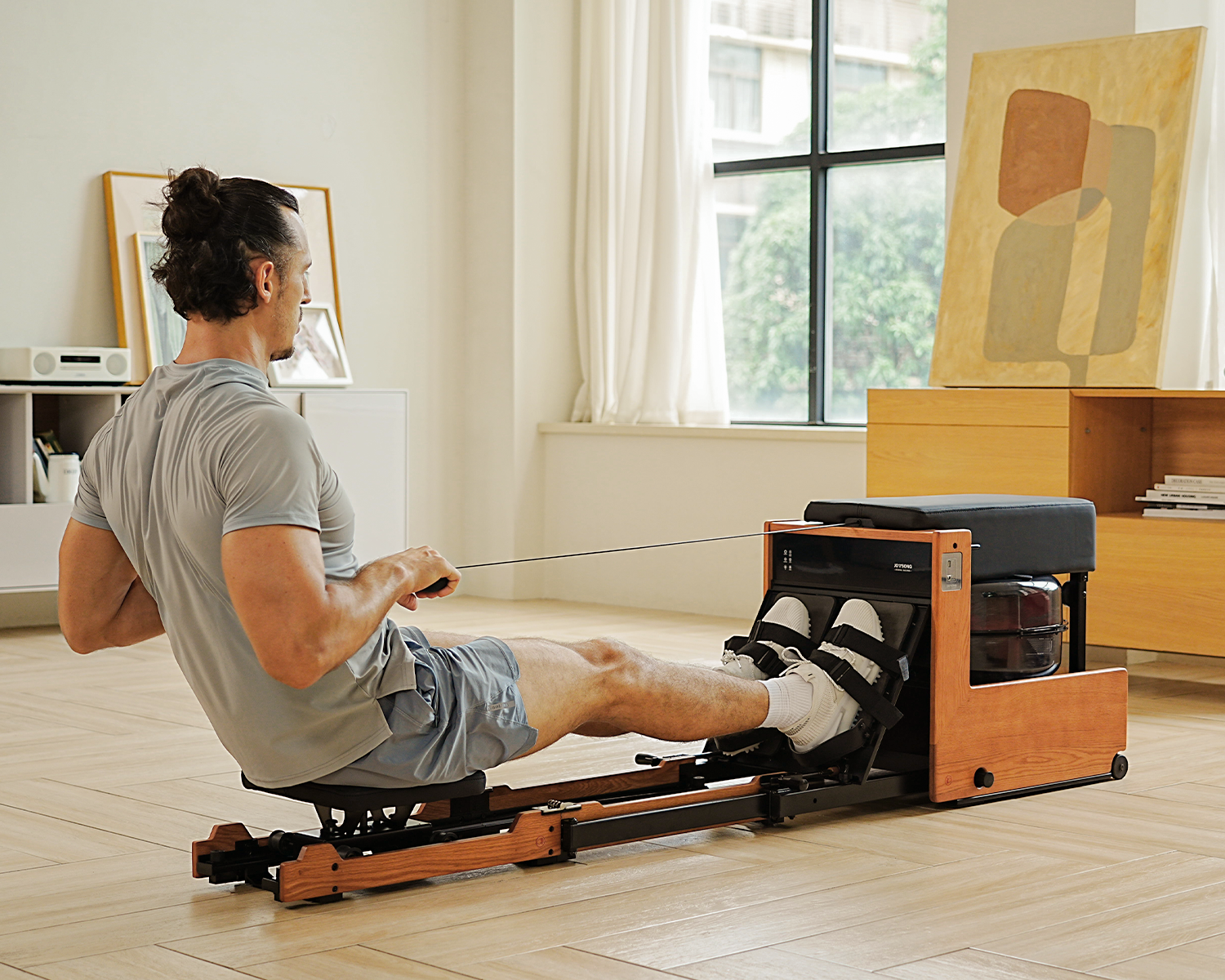 Compact rowing machine for home use