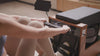 JOYSONG Compact Cube Rower rowing movement in a warm home interior